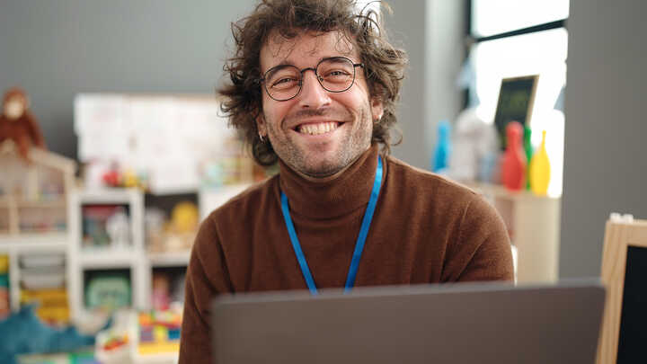 teacher using a laptop