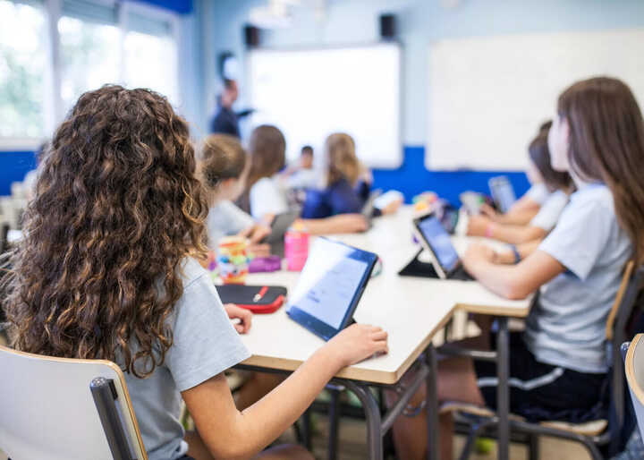 kids using laptops in a science lesson